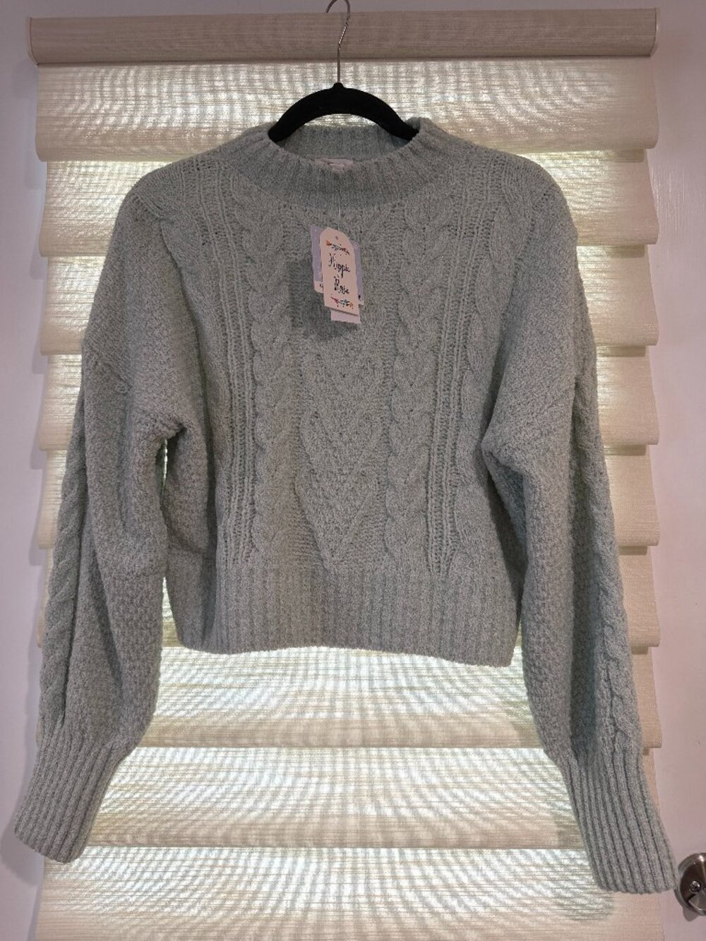 mint green sweater (size M)